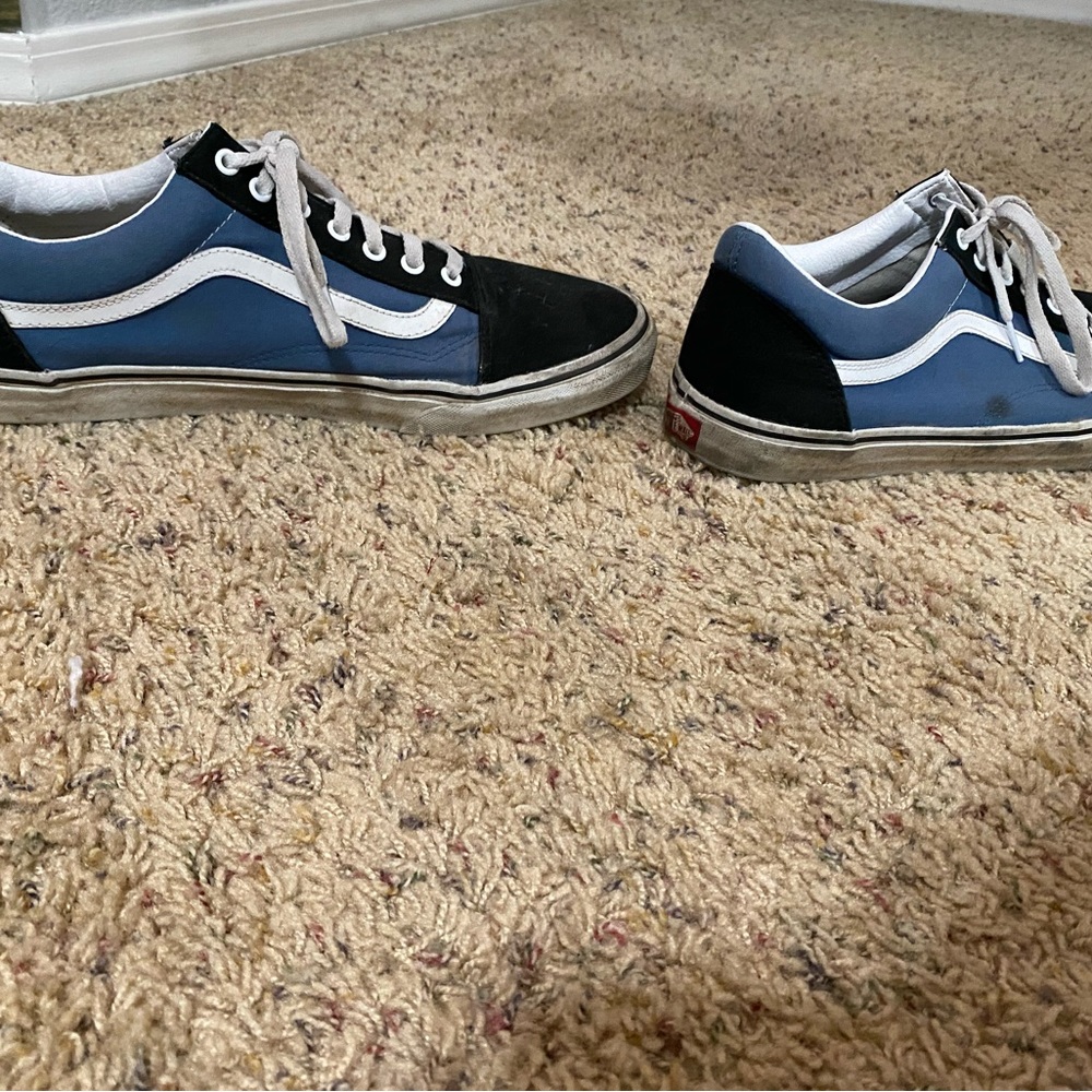 blue and black vans. worn but in good condition